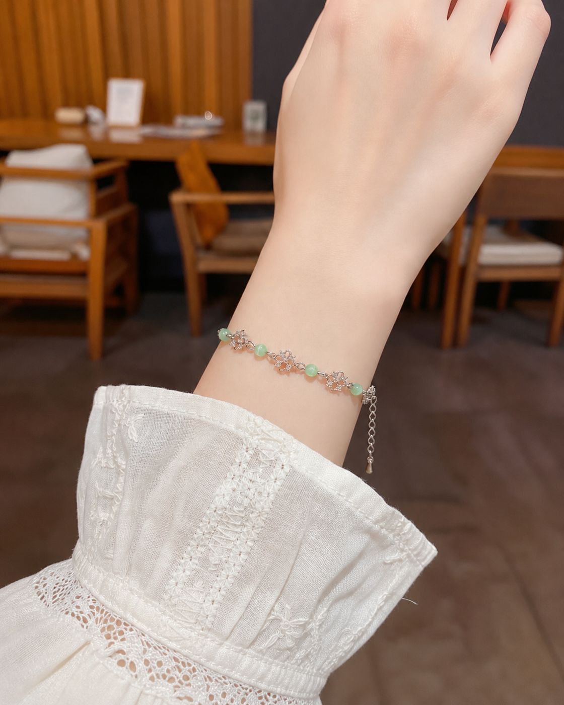 Silver Plated Hollow Flower Bracelet with Zircon Accents