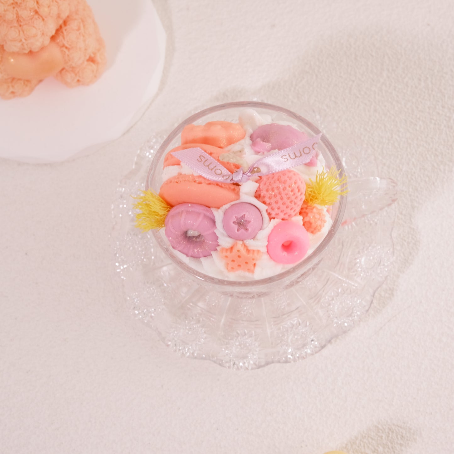 Close-up of Miss Blooms Vintage Teacup Candle showing detailed wax art in pink and peach tones