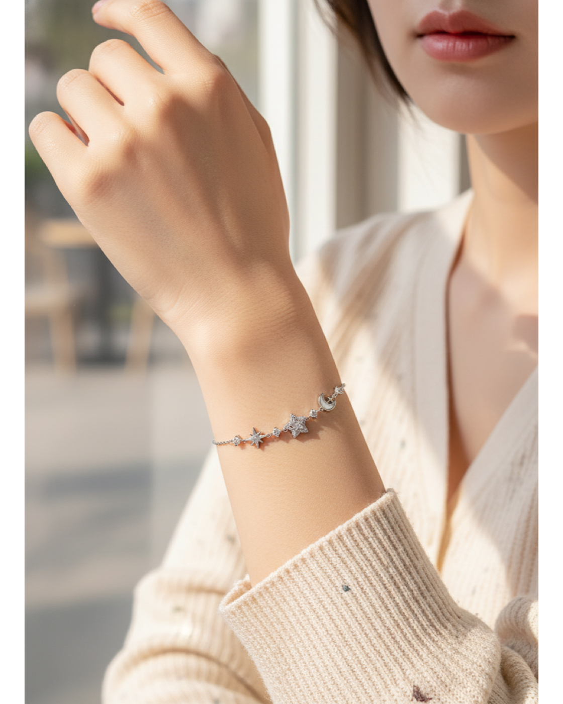 Rhodium Plated Star and Moon Bracelet with Cubic Zirconia