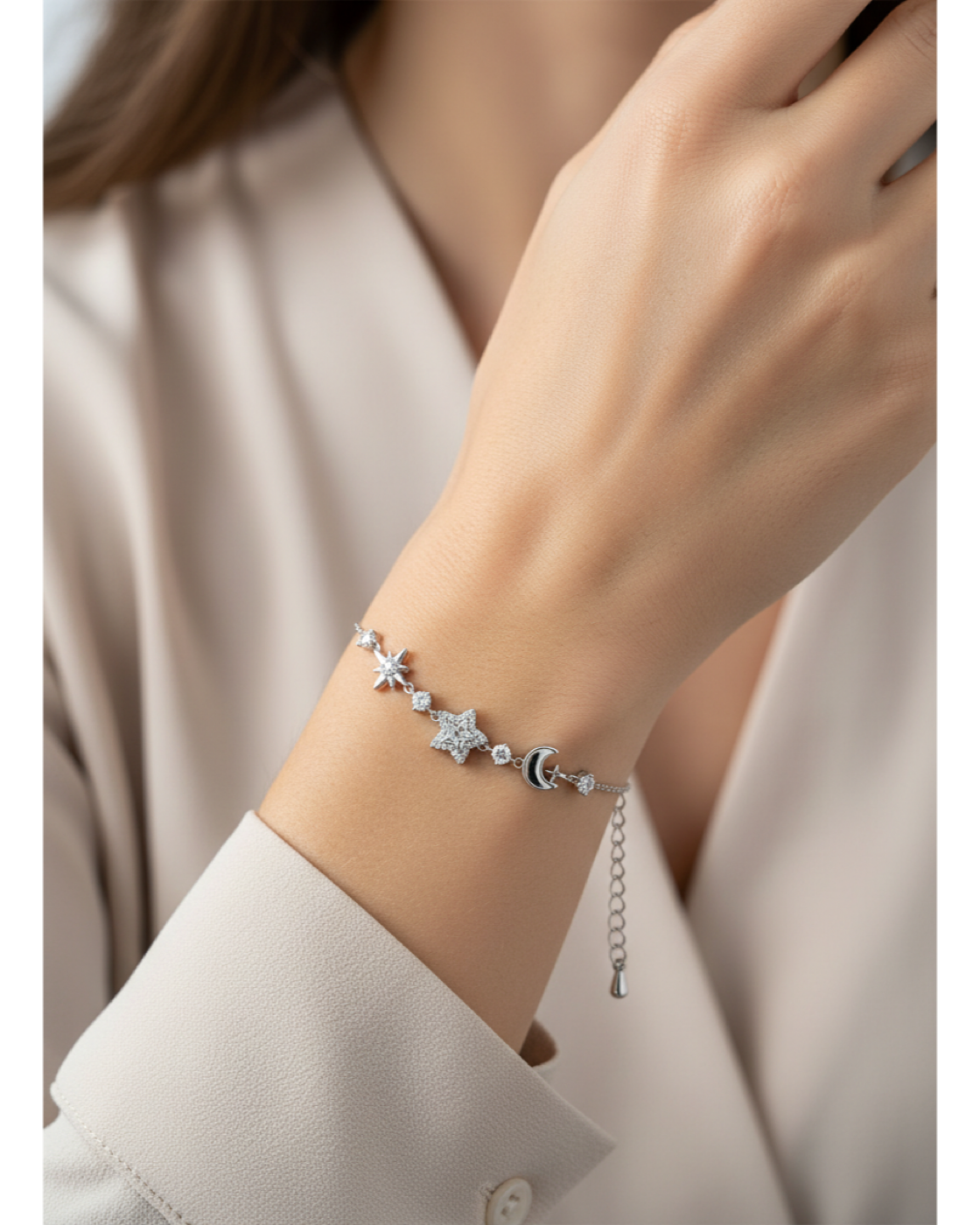Rhodium Plated Star and Moon Bracelet with Cubic Zirconia