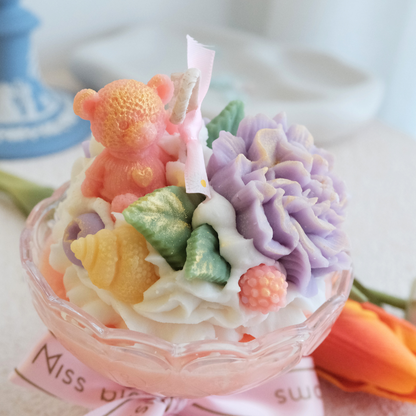 Miss Blooms Blossom Big Sundae Candle close-up showing lavender carnation and mixed floral wax art on cream soy wax