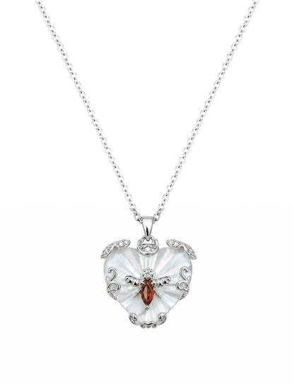 Rhodium Plated Heart Pendant Necklace with Amber Accent
