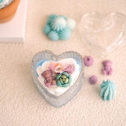 Miss Blooms Cozy Heartscape Cactus Candle — heart-shaped ribbed blue crystal jar with wax teddy bear and teal succulent, Australian Bush soy candle Canberra