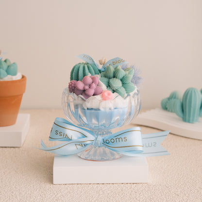 Sweet Succulent Swirl Cactus Candle front view — Miss Blooms soy candle with wax succulent garden in blue compote glass, handmade in Canberra Australia