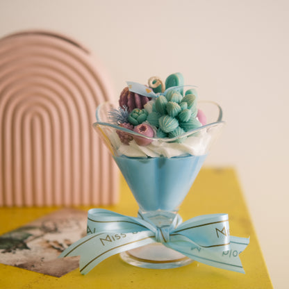 Miss Blooms Parfait Cactus Candle on yellow background — teal cactus and succulent wax botanical candle in parfait glass, handmade soy candle Canberra