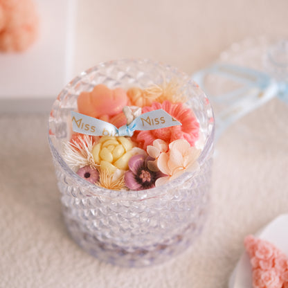 Miss Blooms Honey Bloom Flower Candle close-up of floral wax arrangement inside hobnail glass mug showing petal detail