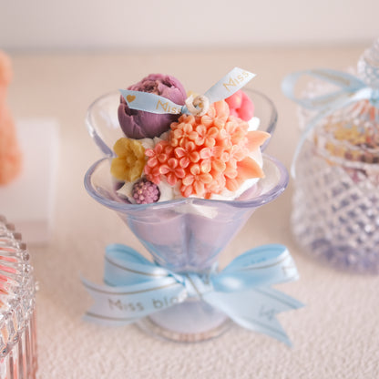 Miss Blooms Blush Garden Flower Cup Candle — side view of lilac martini glass candle with chrysanthemum and peony wax arrangement