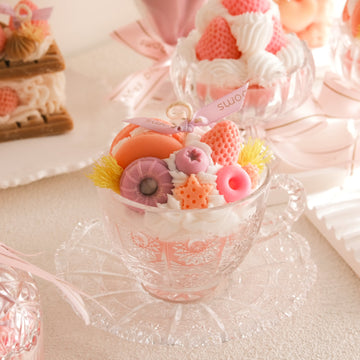 Miss Blooms Sweet Treats Candle in Vintage Teacup — pink crystal teacup filled with macarons, flowers and strawberry wax decorations