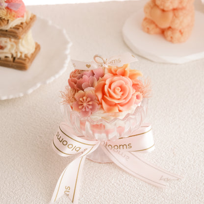 Miss Blooms Flower Small Sundae Candle in a pedestal sundae glass with peach rose and floral wax toppings, Miss Blooms ribbon bow