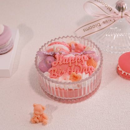 Miss Blooms Happy Birthday Bowl Candle with lid resting beside showing full decorated candle with Happy Birthday text and bear