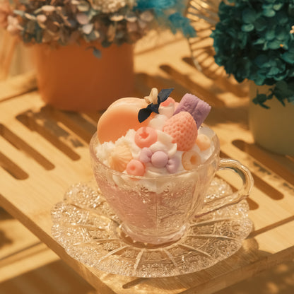 Miss Blooms Gourmet Dessert Vintage Teacup Candle showing teacup and saucer with pastel wax dessert arrangement