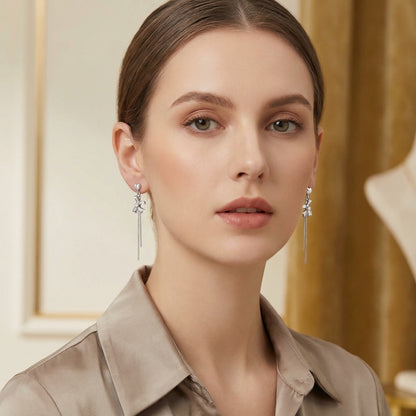 Dainty Heart And Bow Drop Rhodium Plated Sterling Silver Earring