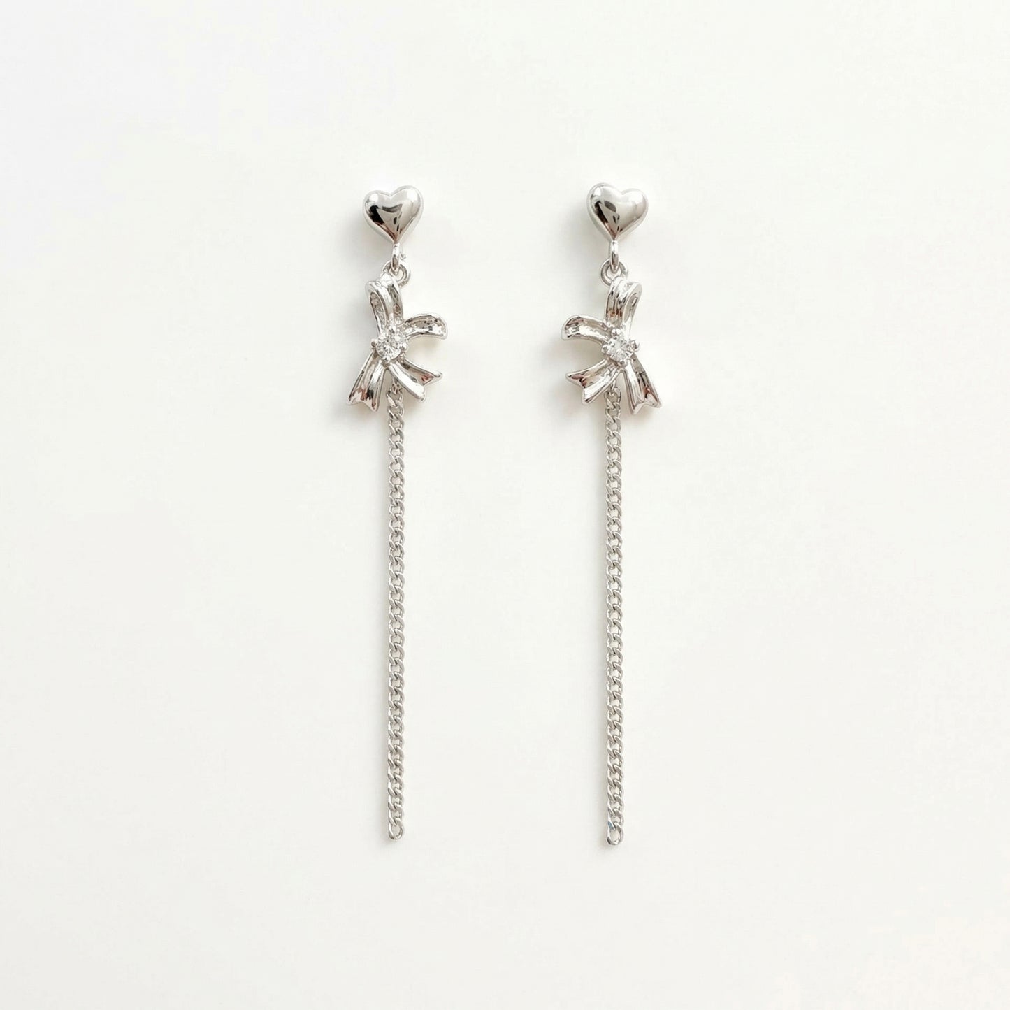 Dainty Heart And Bow Drop Rhodium Plated Sterling Silver Earring