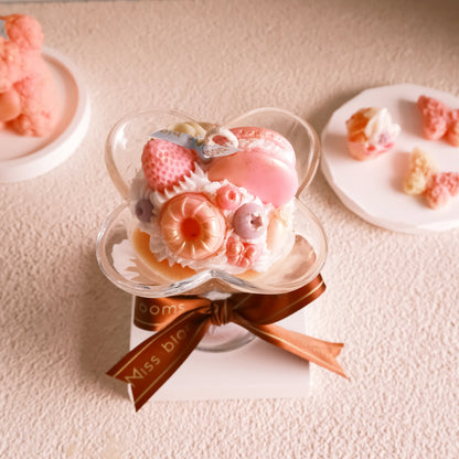 Miss Blooms Ice Cream Cup Candle product flatlay with bear and macarons around