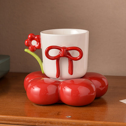 Cute Flower Base Ceramic Mug – Bow Knot Coffee Cup with Floral Handle