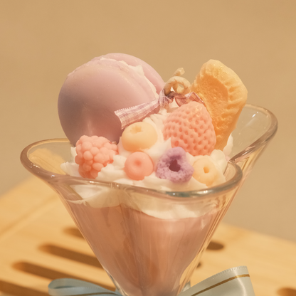 Product details of Miss Blooms Sweet Treats Cup Candle showing wax decoration arrangement